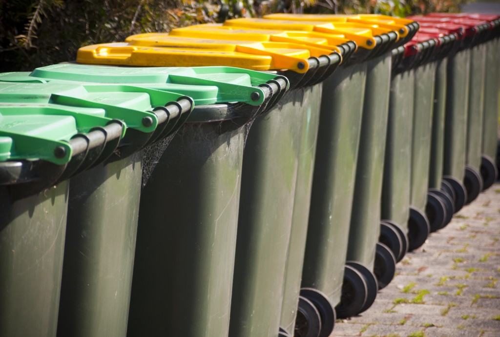 row of trash bins