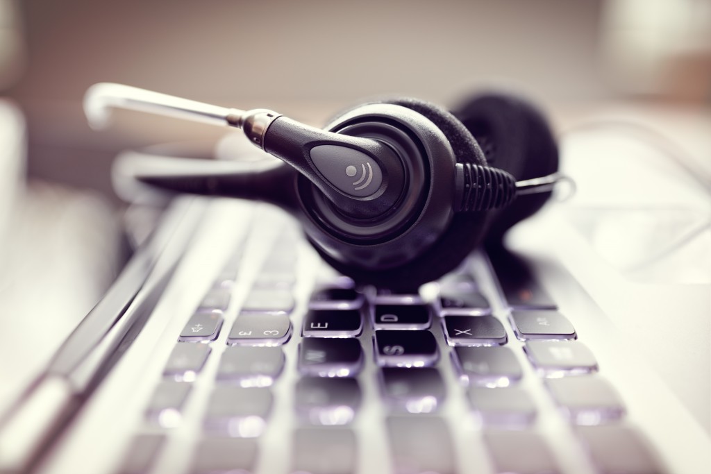 VOIP headset on laptop computer keyboard