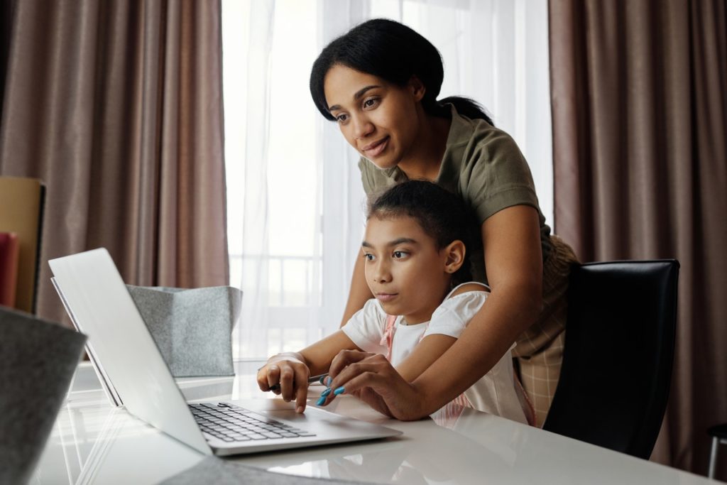 mother and child on the computer