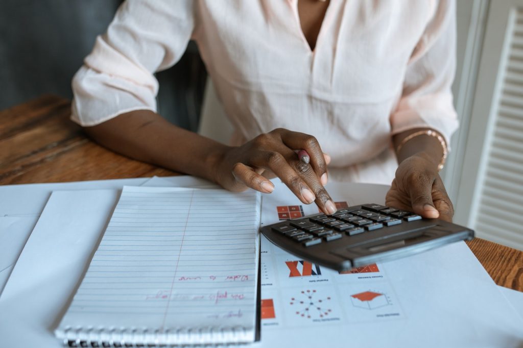 woman calculating expenses