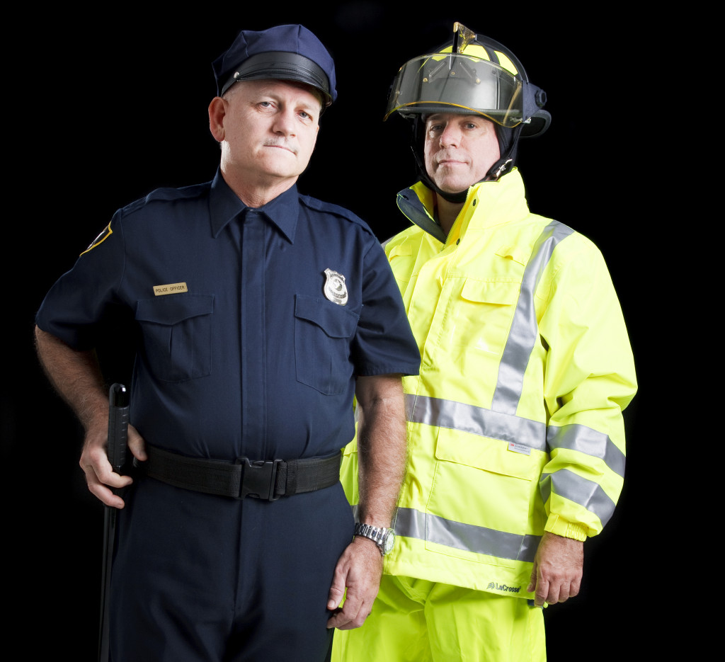 Police officer and firefighter responding to an emergency