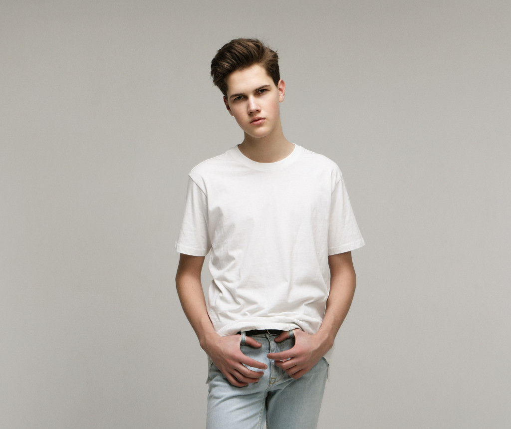 model wearing white shirt and jeans