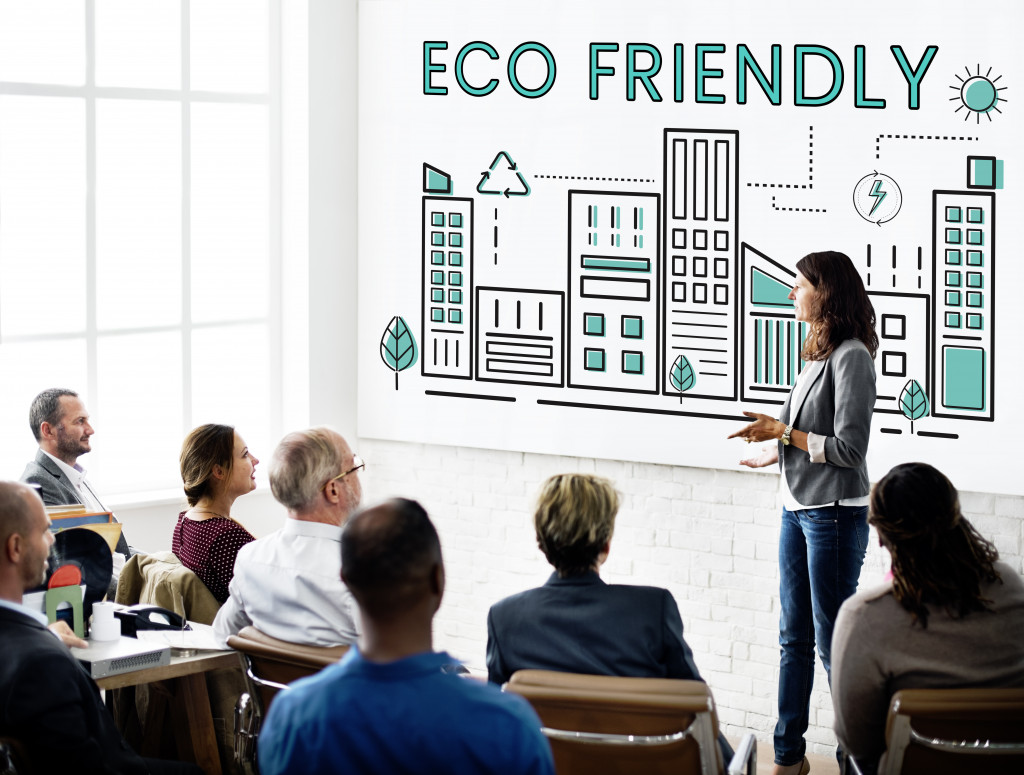 executive having an orientation with employees about how to be eco friendly