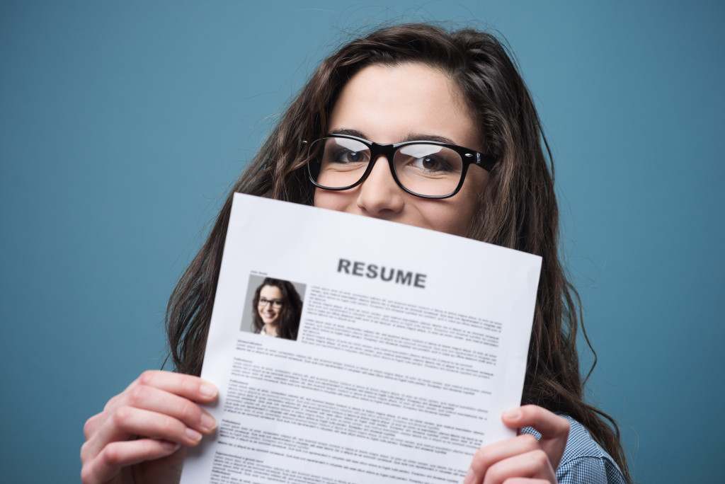 female applicant holding her resume
