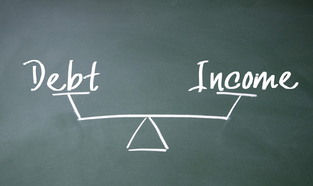 debt and income balance scale